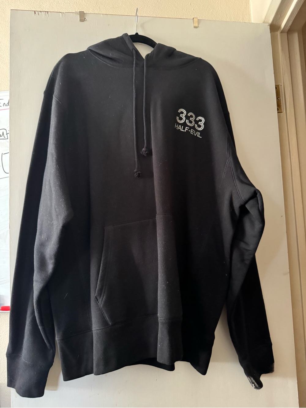 Black 333 Half Evil hoodie with rhinestone text
